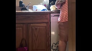 son and mom alone in kitchen