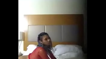 mom and son butt a bed in hotel