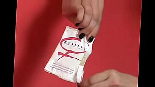 female puts on a condom and is fucked
