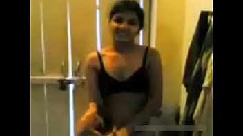 beautiful indian teen girl removing dress